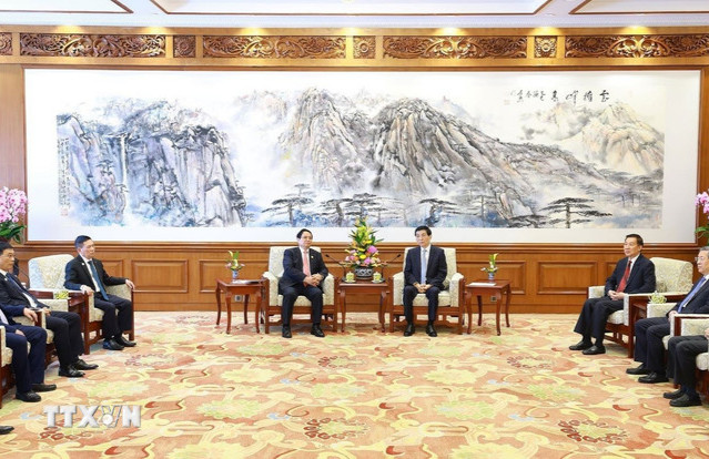 Thủ tướng Chính phủ Phạm Minh Chính hội kiến Chủ tịch Chính hiệp toàn quốc Trung Quốc Vương Hộ Ninh
